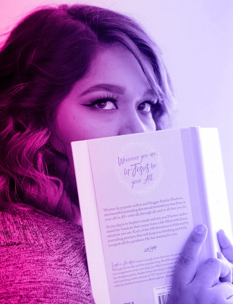 cerebral female narcissist reading a book with cold eye stare