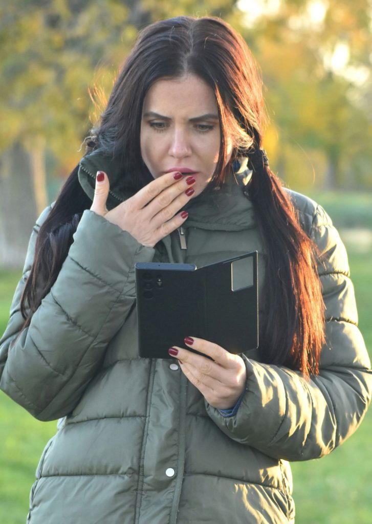 mom gasping as she finds spyware on her phone from new boyfriend